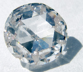 Colorless gem cut from diamond grown by chemical vapor deposition