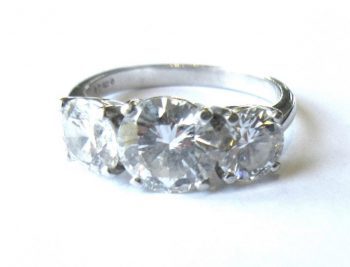 Image of an Asprey three stone diamond ring